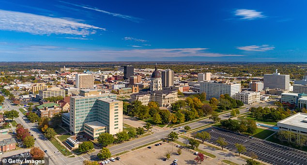 While those looking to spend their retirement in Kansas, the state capital of Topeka seen here, can expect their savings to see almost 20 years